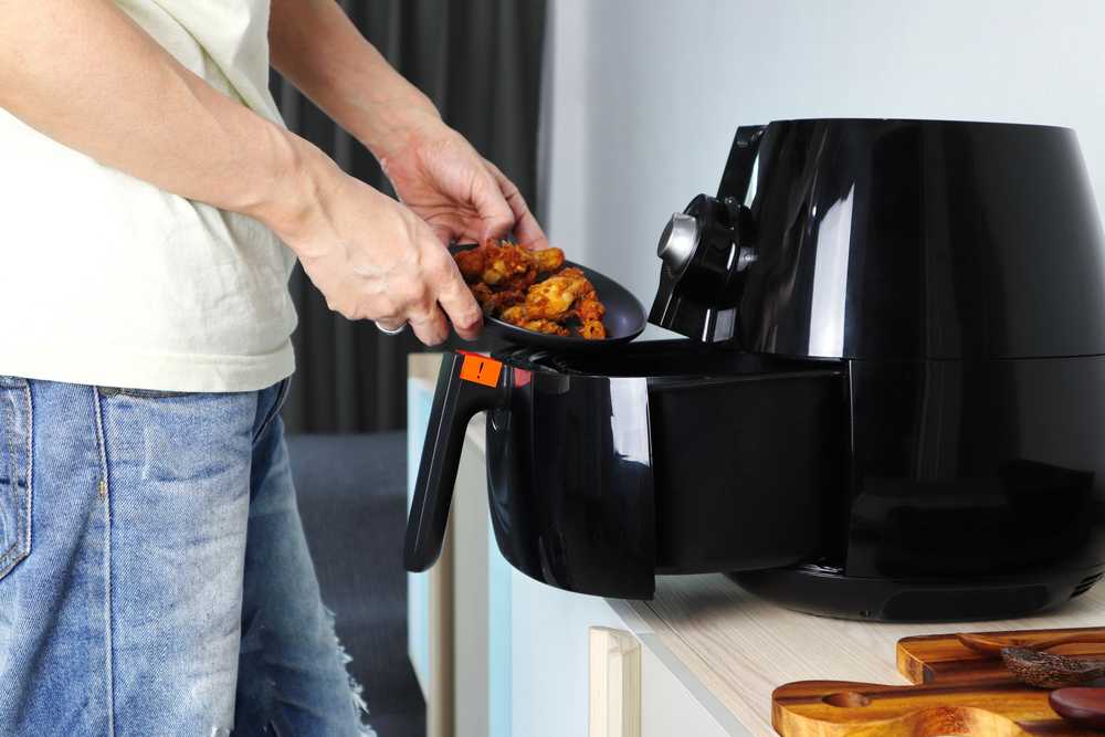 Can you put air fryer on a wooden surface
