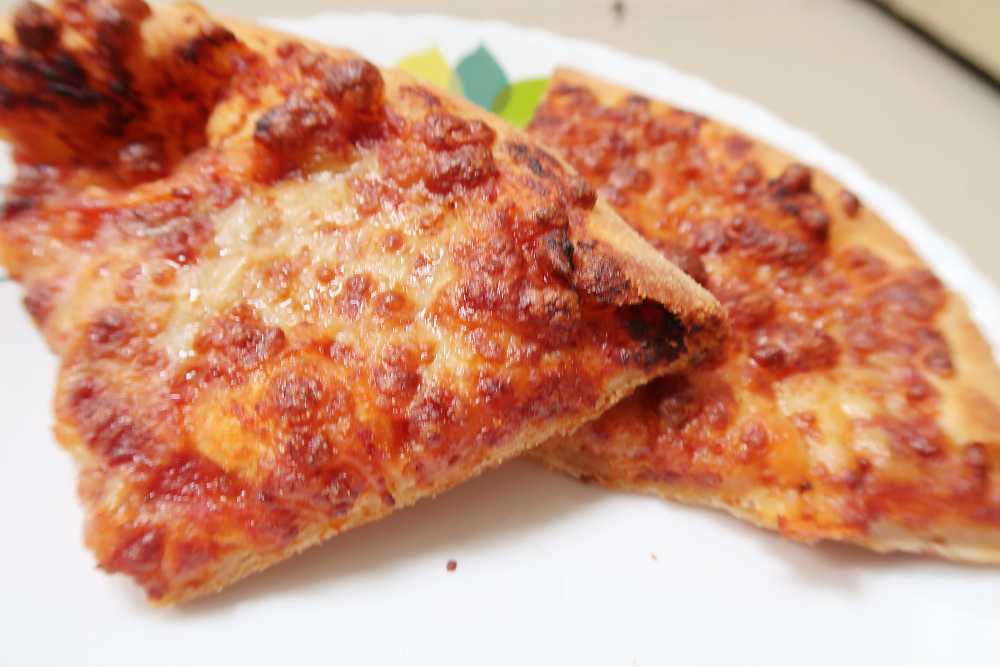 How to Reheat Pizza in an Air Fryer-  Leftover Frozen Slices