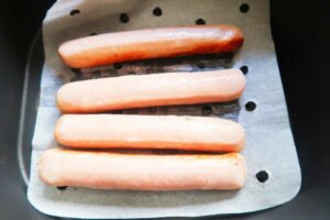 Flipping chicken sausage in air fryer